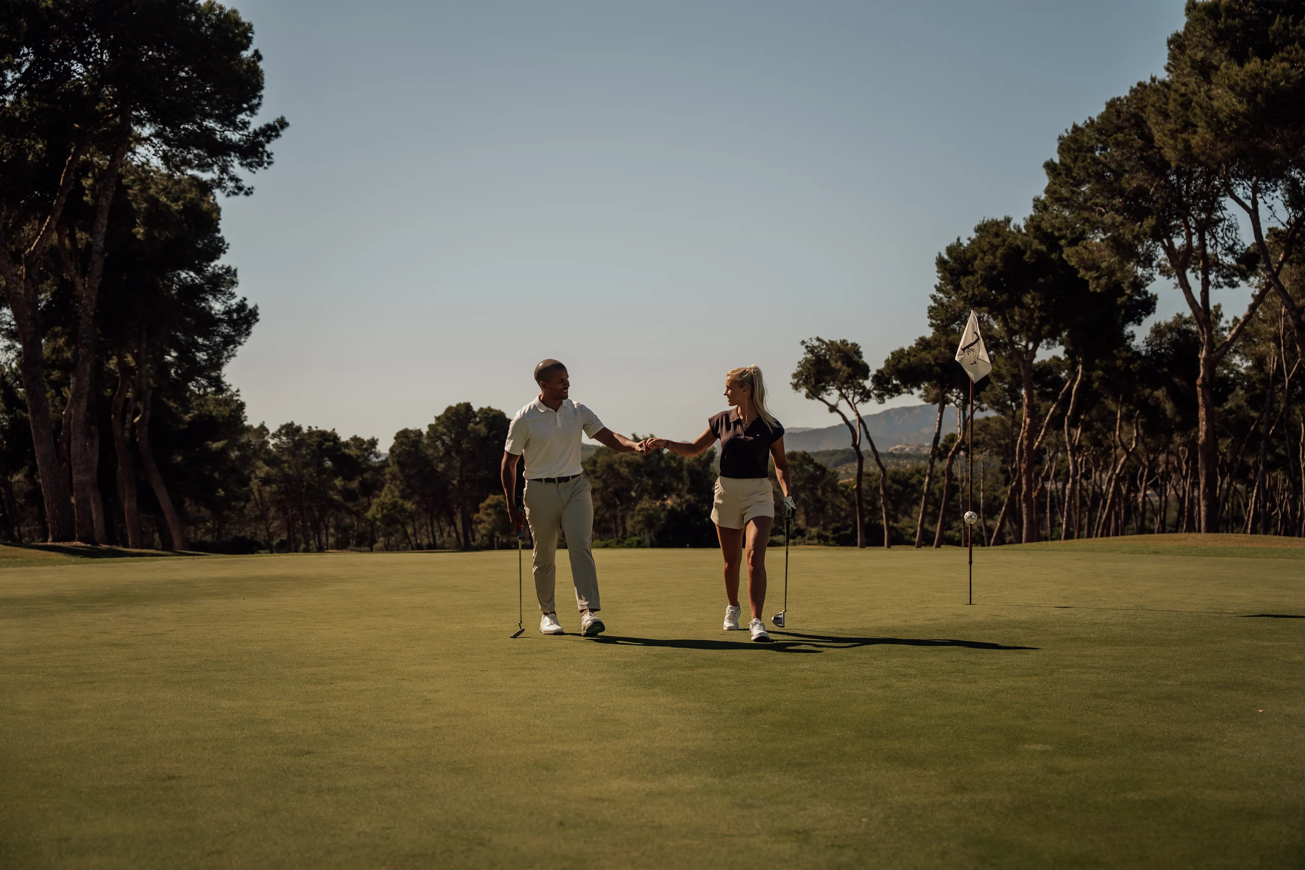 Play With A Pro day in Mallorca with sea and fairway backdrop